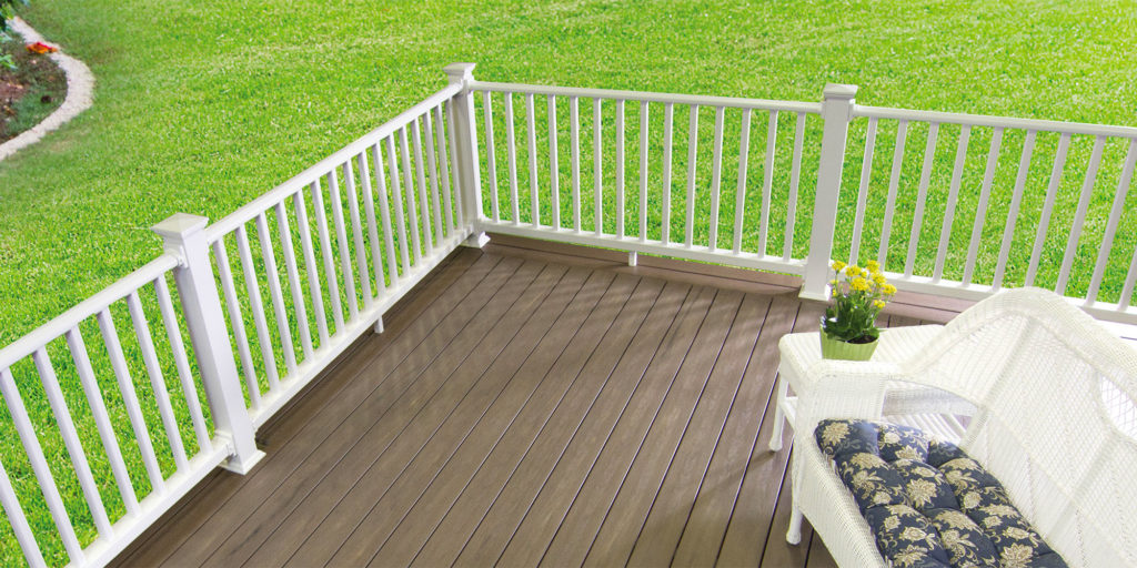 Gray composite decking with white railing