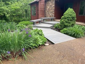 Walkway with Benches and Flowers by Sutton's